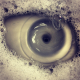 Illustration for article titled The eyeball in this guys sink is one of the best optical illusions weve seen in ages